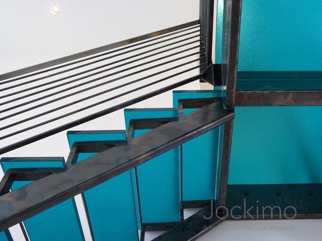 Underside of Blue Glass Stair Treads in a Private Residence in Florida